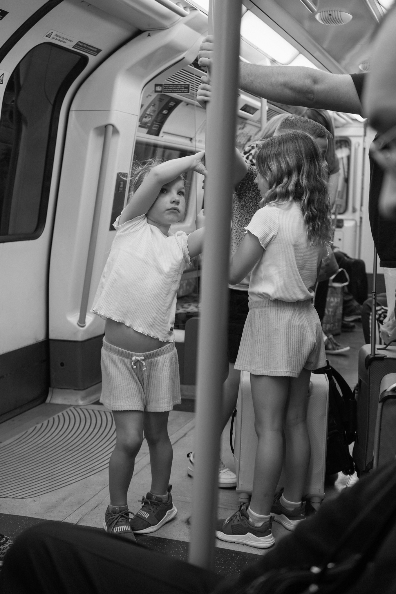 Group of children playing on the London Underground